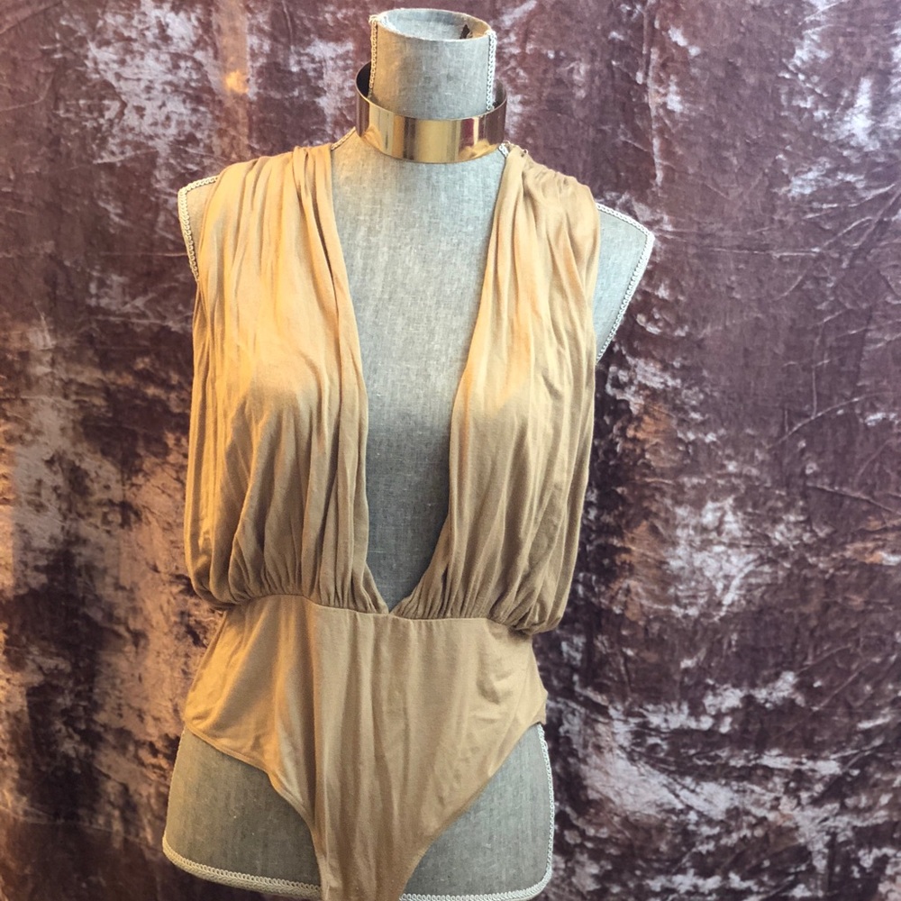 Deep front and back cleavage body suit